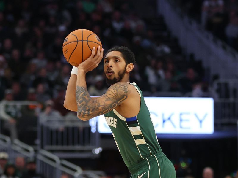 MILWAUKEE, WISCONSIN - DECEMBER 21: Cameron Payne #15 of the Milwaukee Bucks takes a shot during a game against the Orlando Magic at Fiserv Forum on December 21, 2023 in Milwaukee, Wisconsin. NOTE TO USER: User expressly acknowledges and agrees that, by downloading and or using this photograph, User is consenting to the terms and conditions of the Getty Images License Agreement. (Photo by Stacy Revere/Getty Images)