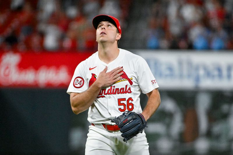 Sep 11, 2024; St. Louis, Missouri, USA;  St. Louis Cardinals relief pitcher Ryan Helsley (56) celebrates after the Cardinals defeated the Cincinnati Reds at Busch Stadium. Mandatory Credit: Jeff Curry-Imagn Images