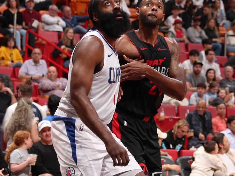 MIAMI, FL - FEBRUARY 4: James Harden #1 of the LA Clippers and Haywood Highsmith #24 of the Miami Heat look to rebound the ball during the game on February 4, 2024 at Kaseya Center in Miami, Florida. NOTE TO USER: User expressly acknowledges and agrees that, by downloading and or using this Photograph, user is consenting to the terms and conditions of the Getty Images License Agreement. Mandatory Copyright Notice: Copyright 2024 NBAE (Photo by Issac Baldizon/NBAE via Getty Images)