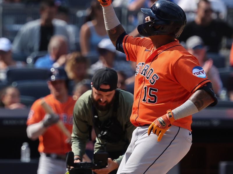 Aug 6, 2023; Bronx, New York, USA; Houston Astros catcher Martin Maldonado (15) celebrates after his solo home run during the sixth inning against the New York Yankees at Yankee Stadium. Mandatory Credit: Vincent Carchietta-USA TODAY Sports