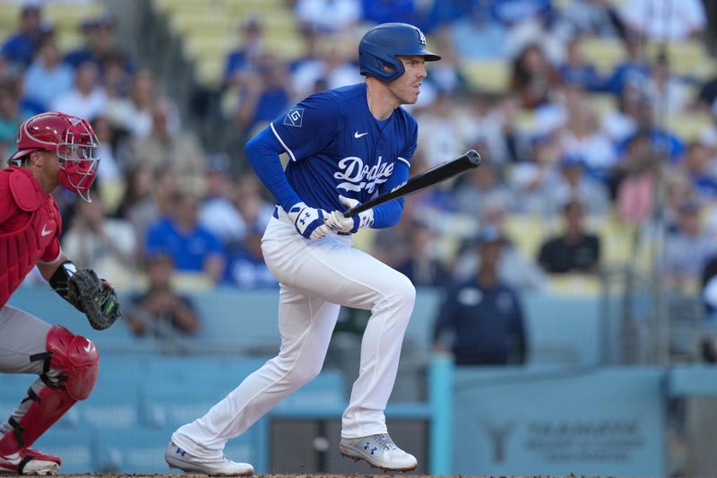 Mar 23, 2025; Los Angeles, California, USA; Los Angeles Dodgers first base Freddie Freeman (5) bats in the first inning against the Los Angeles Angels at Dodger Stadium. Mandatory Credit: Kirby Lee-Imagn Images
