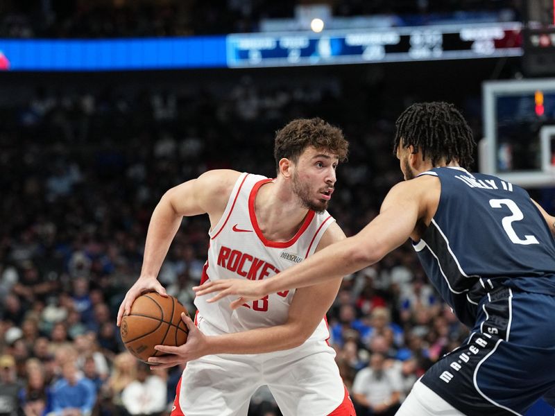 DALLAS, TX - OCTOBER 31: Alperen Sengun #28 of the Houston Rockets looks to pass the ball during the game against the Dallas Mavericks on October 31, 2024 at American Airlines Center in Dallas, Texas. NOTE TO USER: User expressly acknowledges and agrees that, by downloading and or using this photograph, User is consenting to the terms and conditions of the Getty Images License Agreement. Mandatory Copyright Notice: Copyright 2024 NBAE (Photo by Glenn James/NBAE via Getty Images)