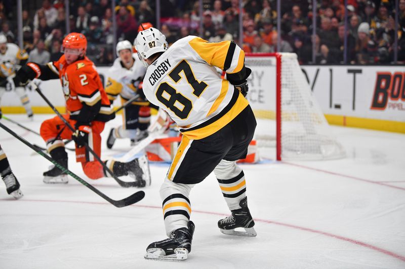 Oct 14, 2025; Anaheim, California, USA; Pittsburgh Penguins center Sidney Crosby (87) shoots on goal against the Anaheim Ducks during the third period at Honda Center. Mandatory Credit: Gary A. Vasquez-Imagn Images