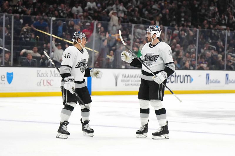 Apr 13, 2024; Los Angeles, California, USA; LA Kings defenseman Matt Roy (3) celebrates with center Blake Lizotte (46) after scoring a goal against the Anaheim Ducks in the second period at Crypto.com Arena. Mandatory Credit: Kirby Lee-USA TODAY Sports