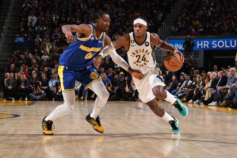 SAN FRANCISCO, CA - DECEMBER 5: Buddy Hield #24 of the Indiana Pacers handles the ball during the game against the Golden State Warriors on December 5, 2022 at Chase Center in San Francisco, California. NOTE TO USER: User expressly acknowledges and agrees that, by downloading and or using this photograph, user is consenting to the terms and conditions of Getty Images License Agreement. Mandatory Copyright Notice: Copyright 2022 NBAE (Photo by Noah Graham/NBAE via Getty Images)