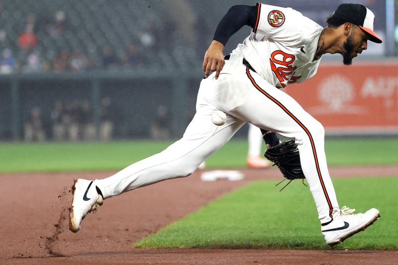 Sep 10, 2025; Baltimore, Maryland, USA; Baltimore Orioles second baseman Jeremiah Jackson (82) cannot field the ball during the eighth inning against the Pittsburgh Pirates at Oriole Park at Camden Yards. Mandatory Credit: Daniel Kucin Jr.-Imagn Images