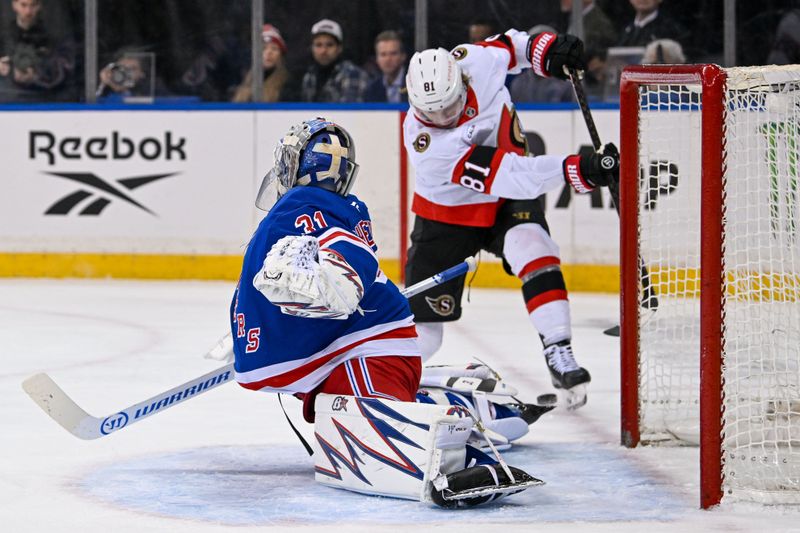 Jan 21, 2025; New York, New York, USA;  Ottawa Senators right wing Adam Gaudette (81) attemtps a shot on New York Rangers goaltender Igor Shesterkin (31) during the first period at Madison Square Garden. Mandatory Credit: Dennis Schneidler-Imagn Images