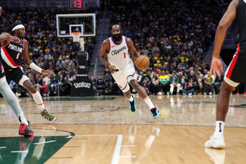 SEATTLE, WA - OCTOBER 11: James Harden #1 of the LA Clippers handles the ball during the game against the Portland Trail Blazers during a NBA Preseason game on October 11, 2024 at the Climate Pledge Arena in Seattle, Washington. NOTE TO USER: User expressly acknowledges and agrees that, by downloading and or using this photograph, user is consenting to the terms and conditions of the Getty Images License Agreement. Mandatory Copyright Notice: Copyright 2024 NBAE (Photo by Liv Lyons/NBAE via Getty Images)