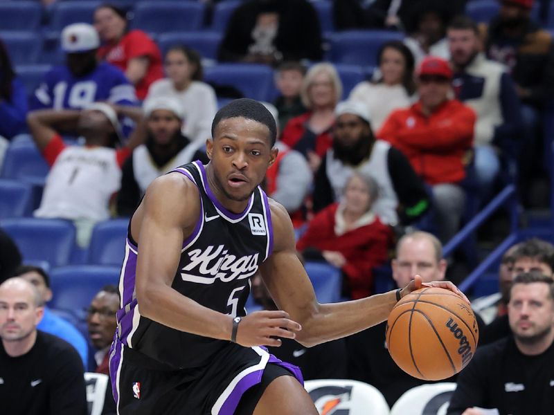 NEW ORLEANS, LOUISIANA - DECEMBER 12: De'Aaron Fox #5 of the Sacramento Kings drives with the ball against the New Orleans Pelicans during a game at the Smoothie King Center on December 12, 2024 in New Orleans, Louisiana. NOTE TO USER: User expressly acknowledges and agrees that, by downloading and or using this Photograph, user is consenting to the terms and conditions of the Getty Images License Agreement. (Photo by Jonathan Bachman/Getty Images)