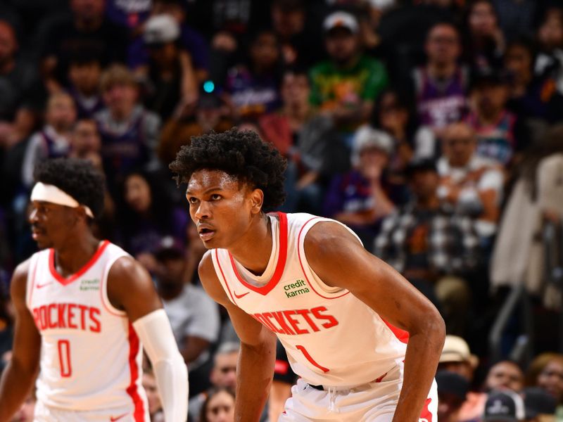 PHOENIX, AZ - MARCH 2: Amen Thompson #1 of the Houston Rockets looks on during the game against the Phoenix Suns on March 2, 2024 at Footprint Center in Phoenix, Arizona. NOTE TO USER: User expressly acknowledges and agrees that, by downloading and or using this photograph, user is consenting to the terms and conditions of the Getty Images License Agreement. Mandatory Copyright Notice: Copyright 2024 NBAE (Photo by Barry Gossage/NBAE via Getty Images)