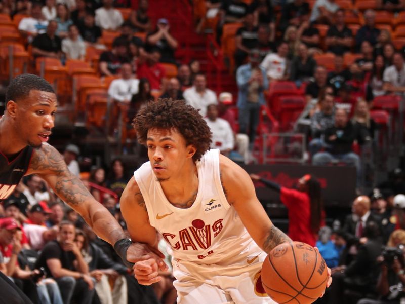 MIAMI, FL - MARCH 24: Craig Porter #9 of the Cleveland Cavaliers handles the ball during the game against the Miami Heat on March 24, 2024 at Kaseya Center in Miami, Florida. NOTE TO USER: User expressly acknowledges and agrees that, by downloading and or using this Photograph, user is consenting to the terms and conditions of the Getty Images License Agreement. Mandatory Copyright Notice: Copyright 2024 NBAE (Photo by Issac Baldizon/NBAE via Getty Images)