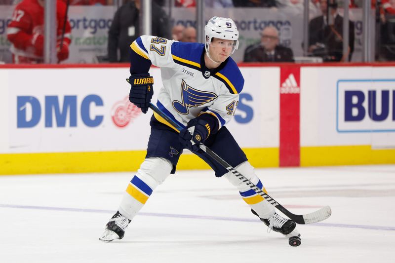 Feb 24, 2024; Detroit, Michigan, USA;  St. Louis Blues defenseman Torey Krug (47) skates with the puck in the third period against the Detroit Red Wings at Little Caesars Arena. Mandatory Credit: Rick Osentoski-USA TODAY Sports
