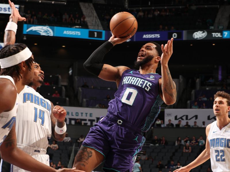 CHARLOTTE, NC - MARCH 5: Miles Bridges #0 of the Charlotte Hornets shoots the ball during the game against the Orlando Magic on March 5, 2024 at Spectrum Center in Charlotte, North Carolina. NOTE TO USER: User expressly acknowledges and agrees that, by downloading and or using this photograph, User is consenting to the terms and conditions of the Getty Images License Agreement. Mandatory Copyright Notice: Copyright 2024 NBAE (Photo by Kent Smith/NBAE via Getty Images)