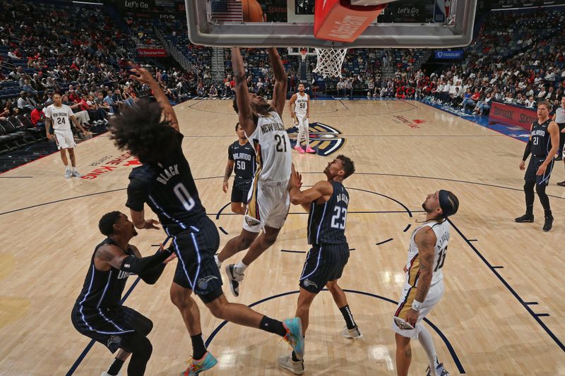 NEW ORLEANS, LA - OCTOBER 7: Yves Misi #21 of the New Orleans Pelicans dunks the ball against the Orlando Magic on October 7, 2024 at the Smoothie King Center in New Orleans, Louisiana. NOTE TO USER: User expressly acknowledges and agrees that, by downloading and or using this Photograph, user is consenting to the terms and conditions of the Getty Images License Agreement. Mandatory Copyright Notice: Copyright 2024 NBAE (Photo by Layne Murdoch Jr./NBAE via Getty Images)