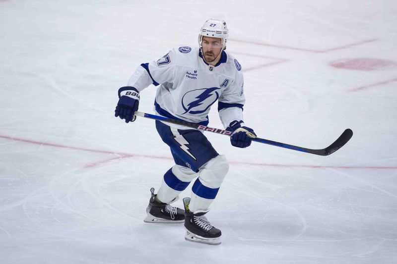 Oct 19, 2024; Ottawa, Ontario, CAN; Tampa Bay Lightning defenseman Ryan McDonagh (27) skates in the third period against the Ottawa Senators at the Canadian Tire Centre. Mandatory Credit: Marc DesRosiers-Imagn Images