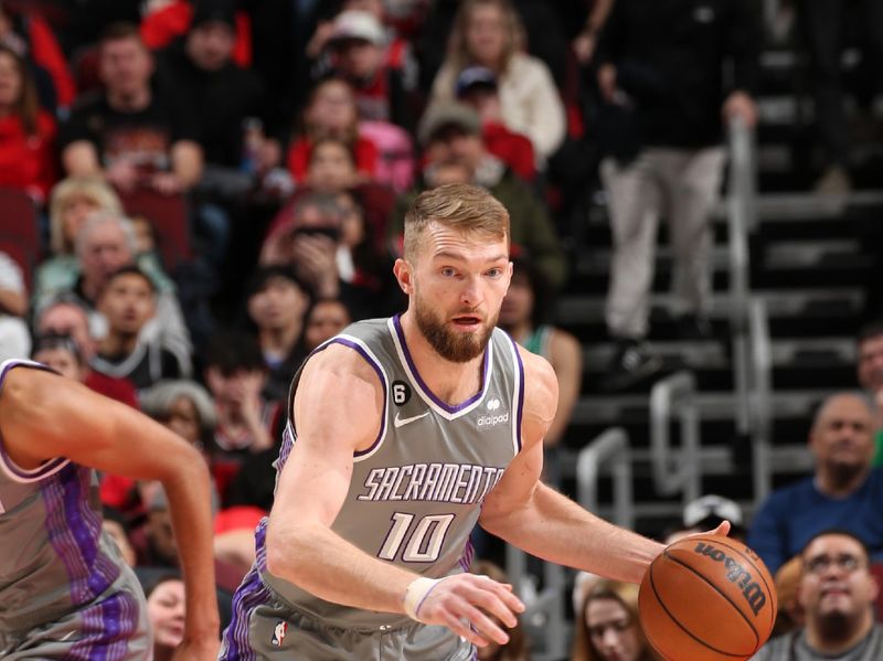 CHICAGO, IL - MARCH 15: Domantas Sabonis #10 of the Sacramento Kings dribbles the ball during the game against the Chicago Bulls on March 15, 2023 at United Center in Chicago, Illinois. NOTE TO USER: User expressly acknowledges and agrees that, by downloading and or using this photograph, User is consenting to the terms and conditions of the Getty Images License Agreement. Mandatory Copyright Notice: Copyright 2023 NBAE (Photo by Gary Dineen/NBAE via Getty Images)