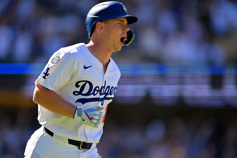 Aug 31, 2025; Los Angeles, California, USA;  Los Angeles Dodgers catcher Will Smith (16) celebrates as he rounds the bases on a walk-off home run in the ninth inning against the Arizona Diamondbacks at Dodger Stadium. Mandatory Credit: Jayne Kamin-Oncea-Imagn Images