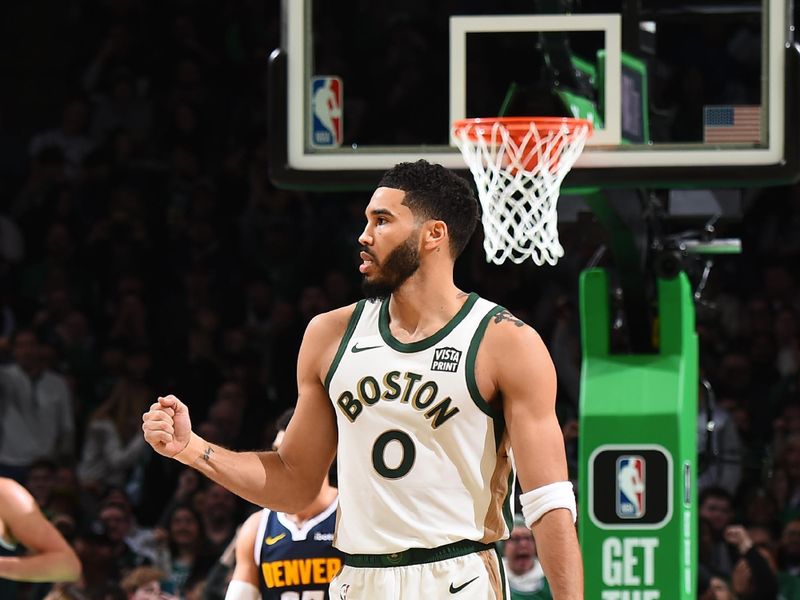 BOSTON, MA - JANUARY 19:  Jayson Tatum #0 of the Boston Celtics celebrates during the game against the Denver Nuggets on January 19, 2024 at the TD Garden in Boston, Massachusetts. NOTE TO USER: User expressly acknowledges and agrees that, by downloading and or using this photograph, User is consenting to the terms and conditions of the Getty Images License Agreement. Mandatory Copyright Notice: Copyright 2024 NBAE  (Photo by Brian Babineau/NBAE via Getty Images)