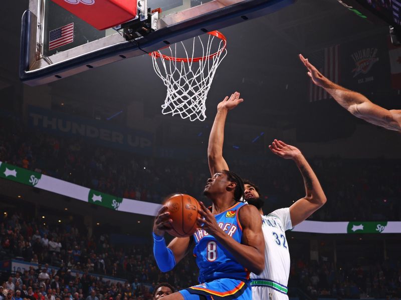 OKLAHOMA CITY, OK - JANUARY 29: Jalen Williams #8 of the Oklahoma City Thunder drives to the basket during the game against the Minnesota Timberwolves on January 29, 2024 at Paycom Arena in Oklahoma City, Oklahoma. NOTE TO USER: User expressly acknowledges and agrees that, by downloading and or using this photograph, User is consenting to the terms and conditions of the Getty Images License Agreement. Mandatory Copyright Notice: Copyright 2024 NBAE (Photo by Zach Beeker/NBAE via Getty Images)