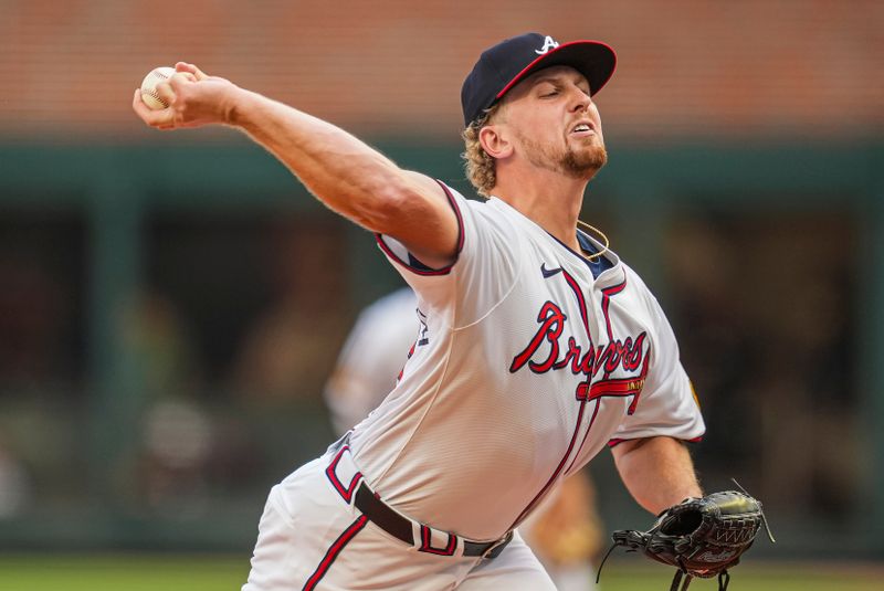 May 29, 2024; Cumberland, Georgia, USA; Atlanta Braves starting pitcher Spencer Schwellenbach (56) pitches against the Washington Nationals during the first inning at Truist Park. Mandatory Credit: Dale Zanine-USA TODAY Sports