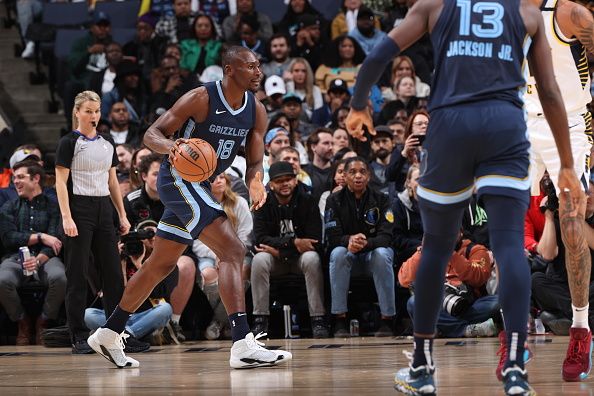 MEMPHIS, TN - DECEMBER 21: Bismack Biyombo #18 of the Memphis Grizzlies dribbles the ball during the game against the Indiana Pacers on December 21, 2023 at FedExForum in Memphis, Tennessee. NOTE TO USER: User expressly acknowledges and agrees that, by downloading and or using this photograph, User is consenting to the terms and conditions of the Getty Images License Agreement. Mandatory Copyright Notice: Copyright 2023 NBAE (Photo by Joe Murphy/NBAE via Getty Images)