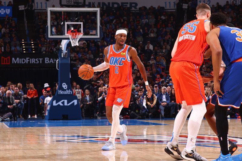 OKLAHOMA CITY, OK - JANUARY 3:  Shai Gilgeous-Alexander #2 of the Oklahoma City Thunder dribbles the ball during the game against the New York Knicks on January 3, 2025 at Paycom Center in Oklahoma City, Oklahoma. NOTE TO USER: User expressly acknowledges and agrees that, by downloading and or using this photograph, User is consenting to the terms and conditions of the Getty Images License Agreement. Mandatory Copyright Notice: Copyright 2025 NBAE (Photo by Zach Beeker/NBAE via Getty Images)