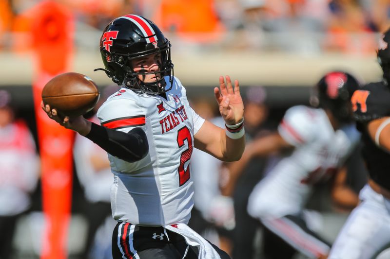 Oct 8, 2022; Stillwater, Oklahoma, USA;  Texas Tech Red Raiders quarterback Behren Morton (2) throws the ball against the Oklahoma State Cowboys in the first quarter at Boone Pickens Stadium. Mandatory Credit: Nathan J Fish/The Oklahoman - USA TODAY NETWORK