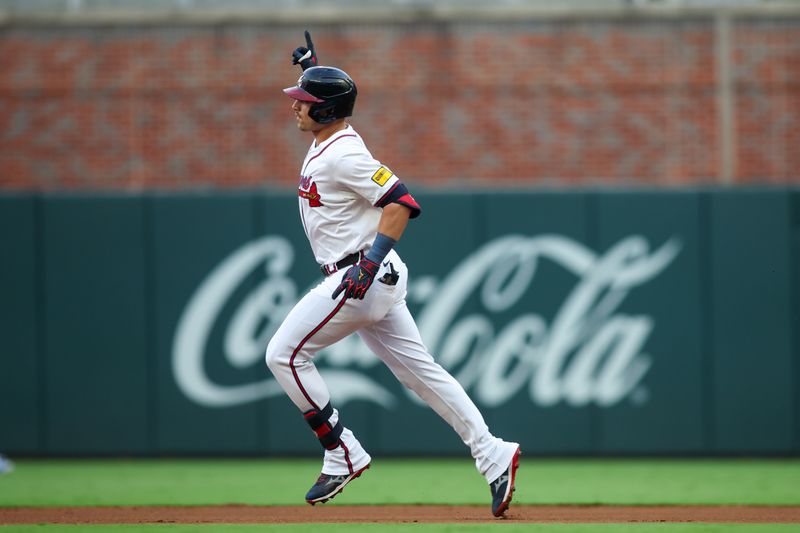 Aug 1, 2024; Atlanta, Georgia, USA; Atlanta Braves third baseman Austin Riley (27) celebrates after a home run against the Miami Marlins in the first inning at Truist Park. Mandatory Credit: Brett Davis-USA TODAY Sports
