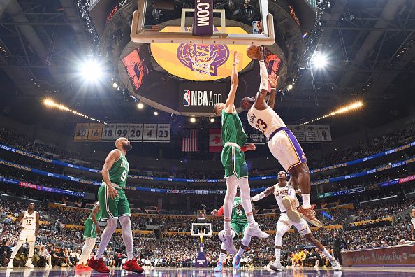 LOS ANGELES, CA - DECEMBER 25: LeBron James #23 of the Los Angeles Lakers drives to the basket during the game Boston Celtics on December 25, 2023 at Crypto.Com Arena in Los Angeles, California. NOTE TO USER: User expressly acknowledges and agrees that, by downloading and/or using this Photograph, user is consenting to the terms and conditions of the Getty Images License Agreement. Mandatory Copyright Notice: Copyright 2023 NBAE (Photo by Andrew D. Bernstein/NBAE via Getty Images)