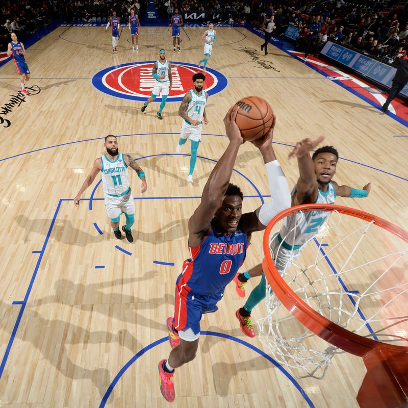 DETROIT, MI - JANUARY 24: Jalen Duren #0 of the Detroit Pistons dunks the ball during the game against the Charlotte Hornets on January 24, 2024 at Little Caesars Arena in Detroit, Michigan. NOTE TO USER: User expressly acknowledges and agrees that, by downloading and/or using this photograph, User is consenting to the terms and conditions of the Getty Images License Agreement. Mandatory Copyright Notice: Copyright 2024 NBAE (Photo by Chris Schwegler/NBAE via Getty Images)