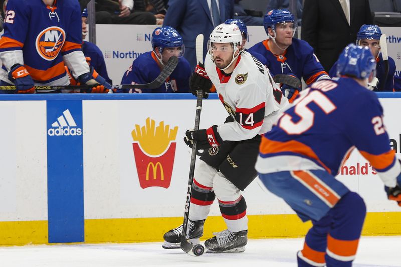 Mar 16, 2024; Elmont, New York, USA;  Ottawa Senators left wing Boris Katchouk (14) skates with the puck against New York Islanders during the third period at UBS Arena. Mandatory Credit: Thomas Salus-USA TODAY Sports