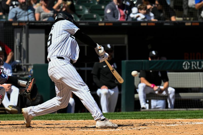 May 11, 2025; Chicago, Illinois, USA;  Chicago White Sox catcher Matt Thaiss (29) singles against the Miami Marlins during the sixth inning at Rate Field. Mandatory Credit: Matt Marton-Imagn Images