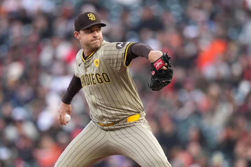 Apr 6, 2024; San Francisco, California, USA; San Diego Padres starting pitcher Michael King (34) throws a pitch against the San Francisco Giants during the first inning at Oracle Park. Mandatory Credit: Darren Yamashita-USA TODAY Sports