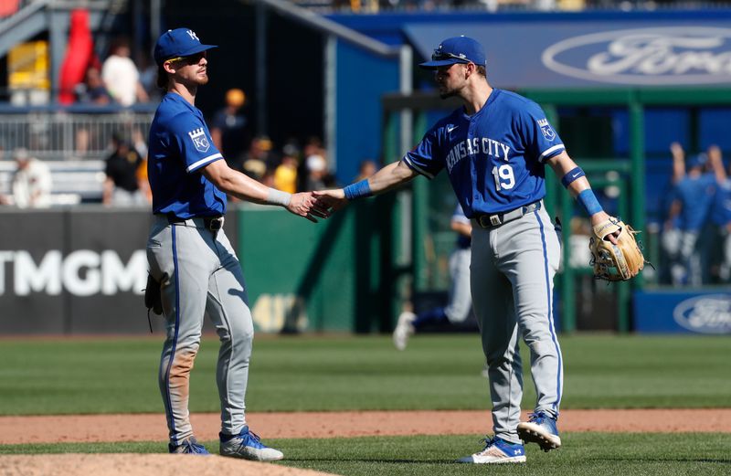 Sep 14, 2024; Pittsburgh, Pennsylvania, USA;  Kansas City Royals shortstop Bobby Witt Jr. (left) and second baseman Michael Massey (19) celebrate after the final out against the Pittsburgh Pirates at PNC Park. Mandatory Credit: Charles LeClaire-Imagn Images
