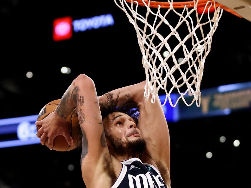 LOS ANGELES, CALIFORNIA - JANUARY 17: Dereck Lively II #2 of the Dallas Mavericks dunks the ball during the second quarter against the Los Angeles Lakers at Crypto.com Arena on January 17, 2024 in Los Angeles, California. NOTE TO USER: User expressly acknowledges and agrees that, by downloading and or using this photograph, User is consenting to the terms and conditions of the Getty Images License Agreement. (Photo by Katelyn Mulcahy/Getty Images)