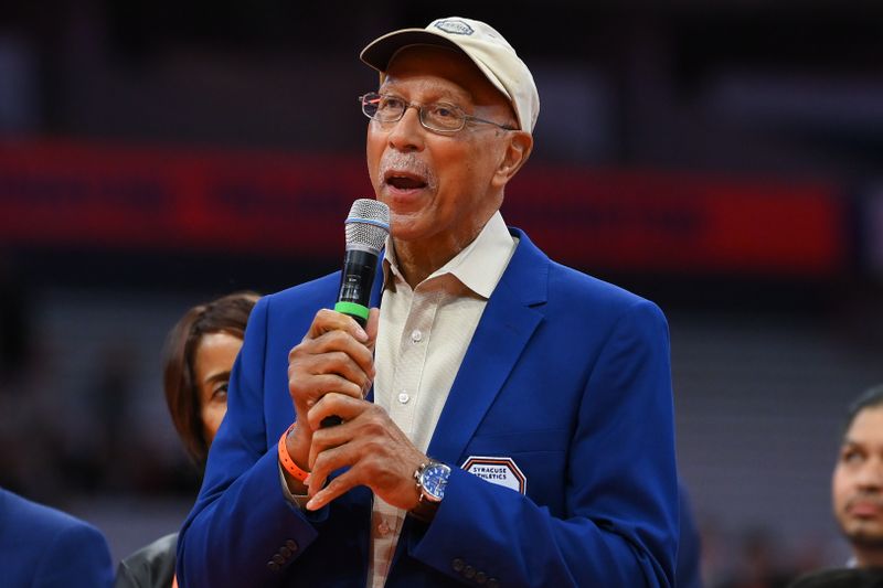 Jan 27, 2024; Syracuse, New York, USA; Former Syracuse Orange great Dave Bing speaks during his Ring of Honor induction ceremony at half time of the against the North Carolina State Wolfpack at the JMA Wireless Dome. Mandatory Credit: Rich Barnes-USA TODAY Sports