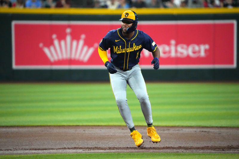 Sep 13, 2024; Phoenix, Arizona, USA; Milwaukee Brewers outfielder Jackson Chourio (11) leads off second base against the Arizona Diamondbacks during the first inning at Chase Field. Mandatory Credit: Joe Camporeale-Imagn Images