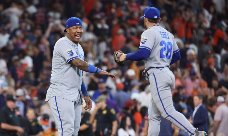 Sep 24, 2023; Houston, Texas, USA; Kansas City Royals designated hitter Salvador Perez (13) celebrates with center fielder Kyle Isbel (28) after the game against the Houston Astros at Minute Maid Park. Mandatory Credit: Troy Taormina-USA TODAY Sports