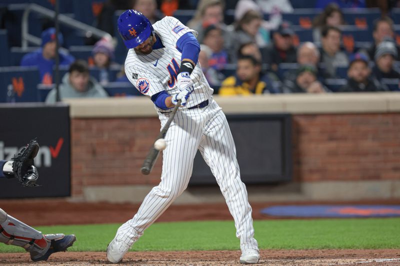 Apr 26, 2024; New York City, New York, USA;  New York Mets designated hitter J.D. Martinez (28) hits an RBI double during the sixth inning against the St. Louis Cardinals at Citi Field. Mandatory Credit: Vincent Carchietta-USA TODAY Sports