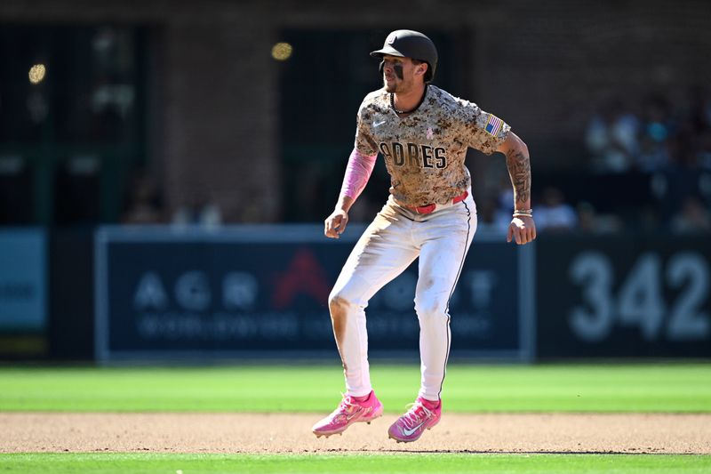 May 12, 2024; San Diego, California, USA; San Diego Padres center fielder Jackson Merrill (3) leads off second base during the eighth inning against the Los Angeles Dodgers at Petco Park. Mandatory Credit: Orlando Ramirez-USA TODAY Sports