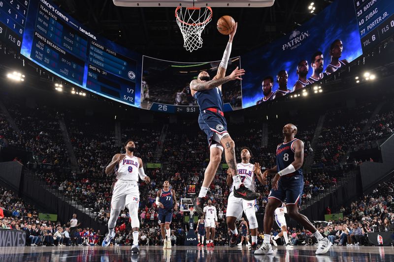 INGLEWOOD, CA - NOVEMBER 6: Amir Coffey #7 of the LA Clippers drives to the basket during the game against the Philadelphia 76ers on November 6, 2024 at Intuit Dome in Los Angeles, California. NOTE TO USER: User expressly acknowledges and agrees that, by downloading and/or using this Photograph, user is consenting to the terms and conditions of the Getty Images License Agreement. Mandatory Copyright Notice: Copyright 2024 NBAE (Photo by Juan Ocampo/NBAE via Getty Images)