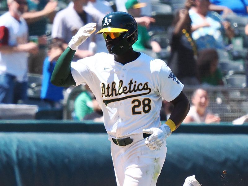 May 23, 2024; Oakland, California, USA; Oakland Athletics left fielder Daz Cameron (28) gestures after hitting a home run against the Colorado Rockies during the ninth inning at Oakland-Alameda County Coliseum. Mandatory Credit: Kelley L Cox-USA TODAY Sports