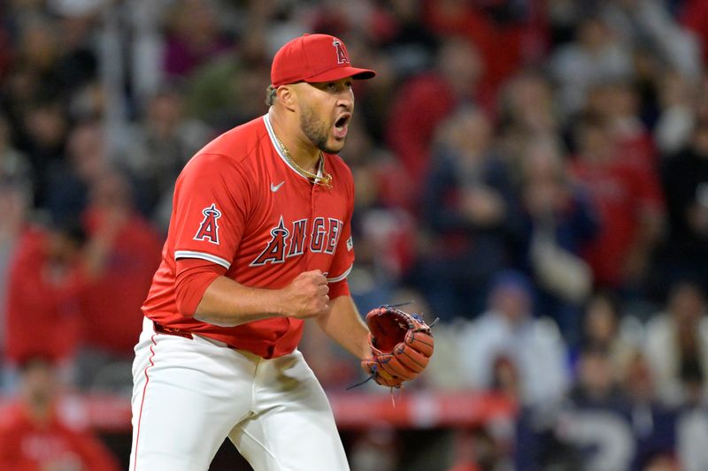 Apr 6, 2024; Anaheim, California, USA; Los Angeles Angels pitcher Carlos Estevez (53) celebrates after the final out of the ninth inning and a save against the Boston Red Sox at Angel Stadium. Mandatory Credit: Jayne Kamin-Oncea-USA TODAY Sports