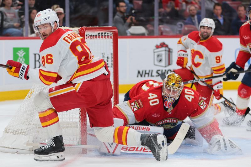 Nov 28, 2025; Sunrise, Florida, USA; Florida Panthers goaltender Daniil Tarasov (40) defends his net against Calgary Flames left wing Joel Farabee (86) during the second period at Amerant Bank Arena. Mandatory Credit: Sam Navarro-Imagn Images Nov 28, 2025; Sunrise, Florida, USA; Florida Panthers goaltender Daniil Tarasov (40) defends his net against Calgary Flames left wing Joel Farabee (86) during the second period at Amerant Bank Arena. Mandatory Credit: Sam Navarro-Imagn Images