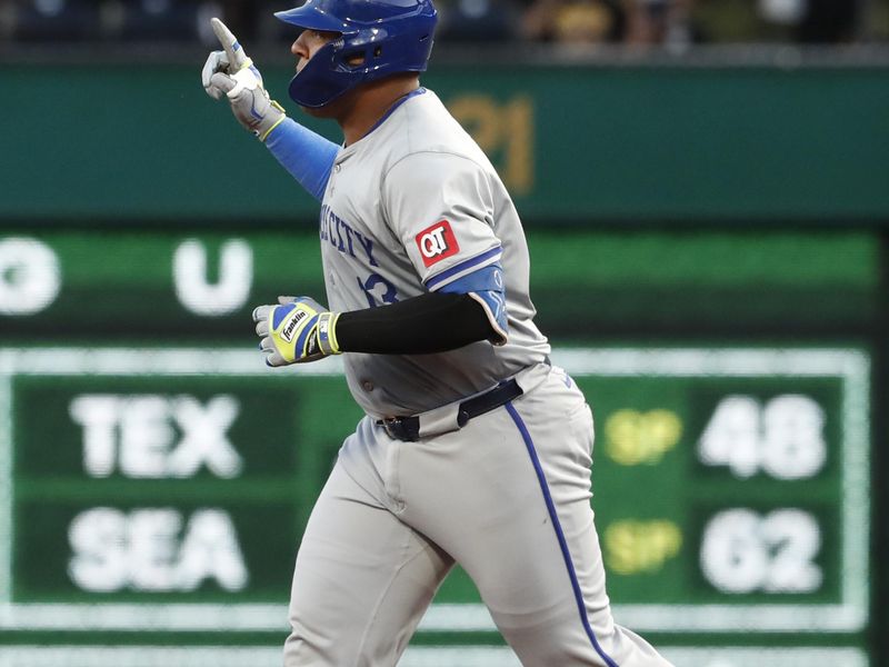 Sep 13, 2024; Pittsburgh, Pennsylvania, USA;  Kansas City Royals catcher Salvador Perez (13) gestures as he circles the bases on a two run home run against the Pittsburgh Pirates during the second inning at PNC Park. Mandatory Credit: Charles LeClaire-Imagn Images