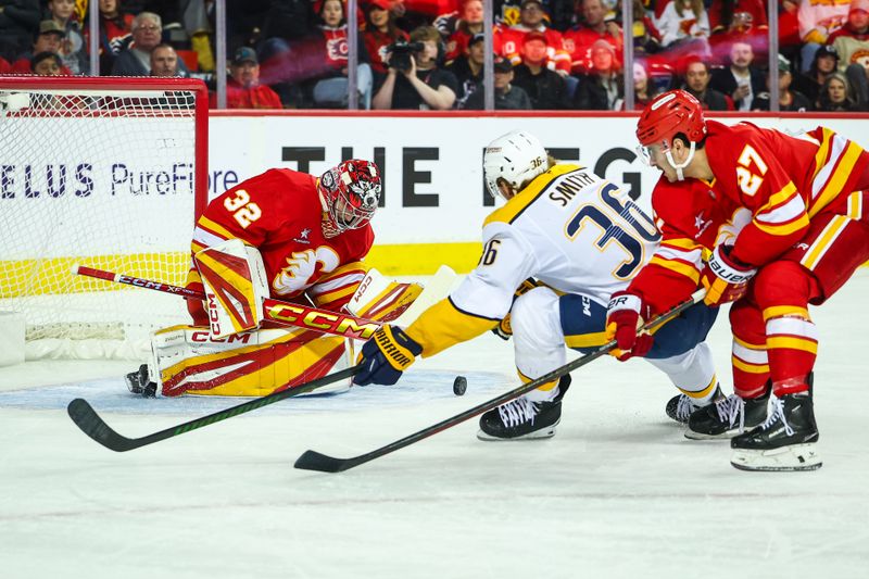 Nov 15, 2024; Calgary, Alberta, CAN; Calgary Flames goaltender Dustin Wolf (32) makes a save against Nashville Predators left wing Cole Smith (36) during the first period at Scotiabank Saddledome. Mandatory Credit: Sergei Belski-Imagn Images