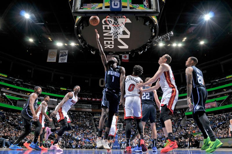 ORLANDO, FL - JANUARY 21: Jonathan Isaac #1 of the Orlando Magic drives to the basket during the game against the Miami Heat on January 21, 2024 at Amway Center in Orlando, Florida. NOTE TO USER: User expressly acknowledges and agrees that, by downloading and or using this photograph, User is consenting to the terms and conditions of the Getty Images License Agreement. Mandatory Copyright Notice: Copyright 2024 NBAE (Photo by Fernando Medina/NBAE via Getty Images)