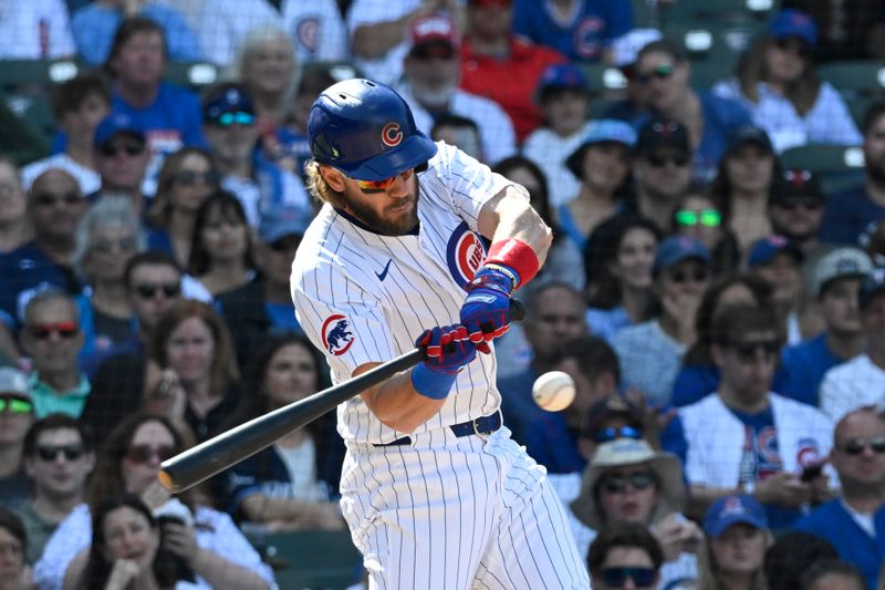 May 4, 2024; Chicago, Illinois, USA;  Chicago Cubs outfielder Patrick Wisdom (16) hits an RBI single against the Milwaukee Brewers during the eighth inning at Wrigley Field. Mandatory Credit: Matt Marton-USA TODAY Sports