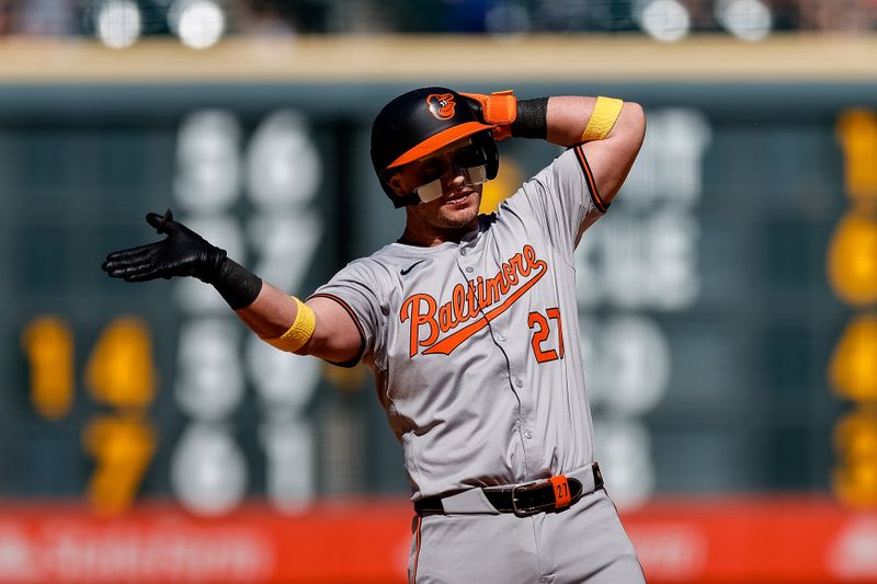 Sep 1, 2024; Denver, Colorado, USA; Baltimore Orioles catcher James McCann (27) reacts from second on a double in the ninth inning against the Colorado Rockies at Coors Field. Mandatory Credit: Isaiah J. Downing-USA TODAY Sports