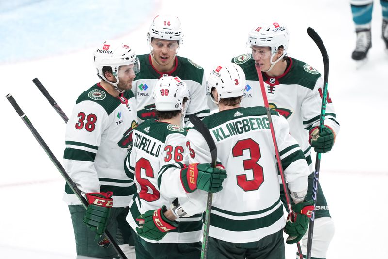 Mar 11, 2023; San Jose, California, USA; Minnesota Wild right wing Mats Zuccarello (36) is congratulated by teammates after scoring a goal against the San Jose Sharks during the third period at SAP Center at San Jose. Mandatory Credit: Darren Yamashita-USA TODAY Sports